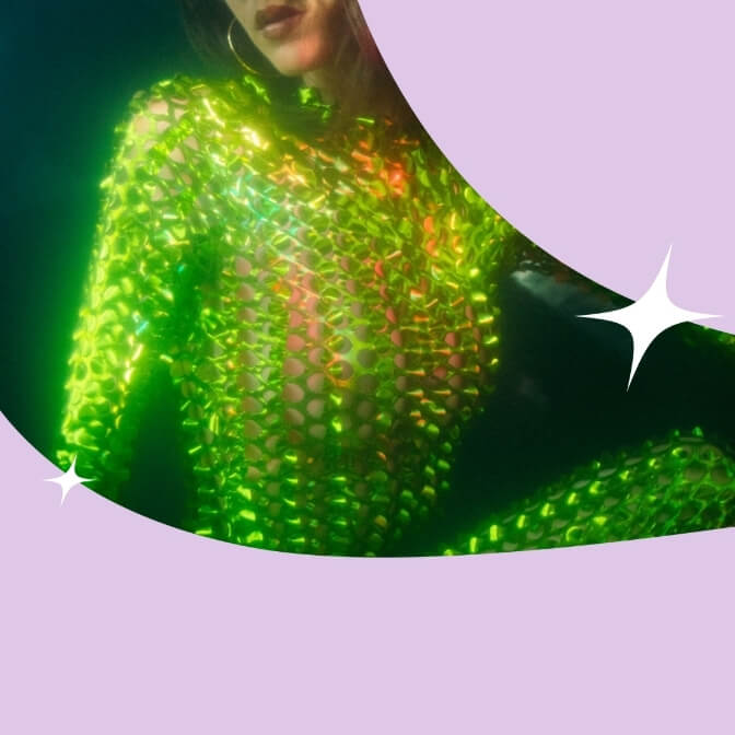 Woman wearing a green outfit. Image has a lilac cutout overlay