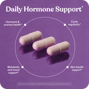Supplement bottle with pills and text about hormone balance and cycle support on a light gray background.