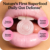 Gut health supplement with text on a close-up of a mouth