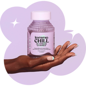 Lemme Chill de-stress gummies bottle held by a hand with a purple background