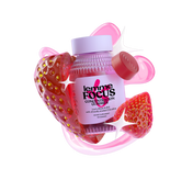 Pink and red chewable supplement container with 'Lemme Focus' branding on a white background