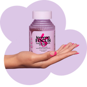 Hand holding a bottle of 'Lemme Focus' gummies against a purple background