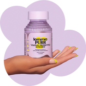 hand holding purple bottle of lemme gummies purr