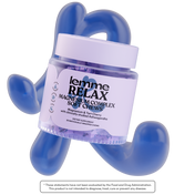 Jar of 'lemme RELAX' magnesium complex soft chews with blue holder on a white background
